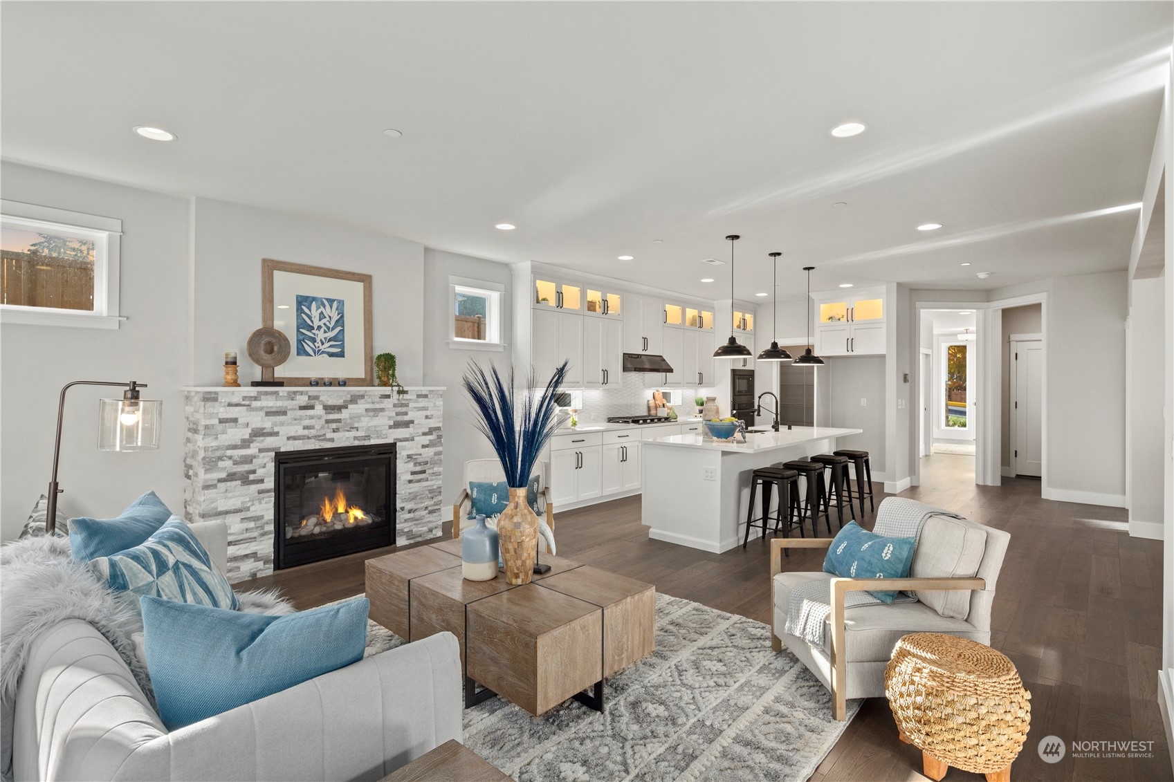 8711 240th Street Southwest Edmonds, WA 98026 - Photo 12 of 37 a living room with furniture and a fireplace