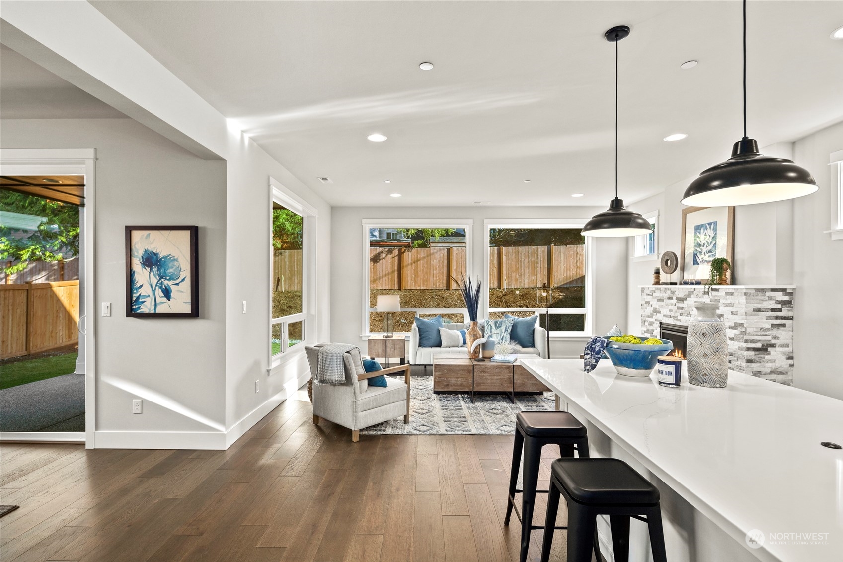 8711 240th Street Southwest Edmonds, WA 98026 - Photo 13 of 37 a living room with furniture and a wooden floor