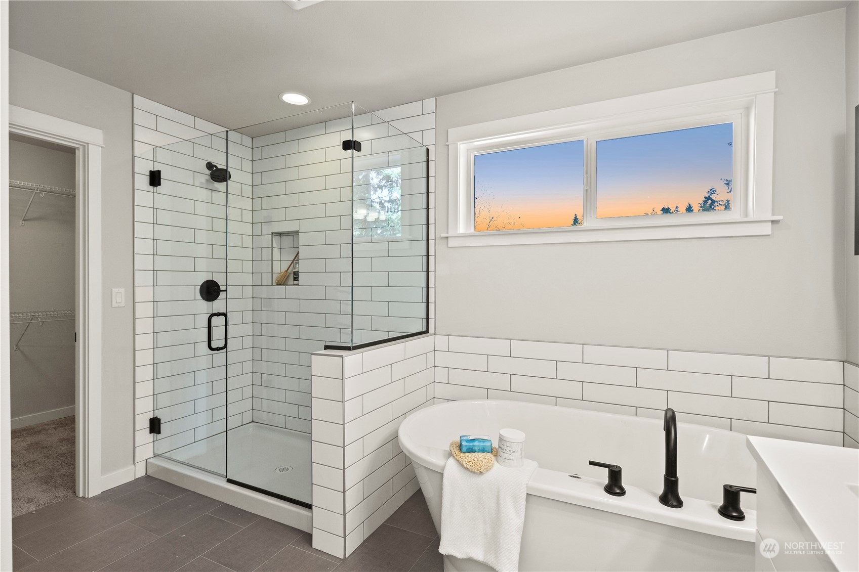 8711 240th Street Southwest Edmonds, WA 98026 - Photo 27 of 37 a bathroom with a bathtub and shower