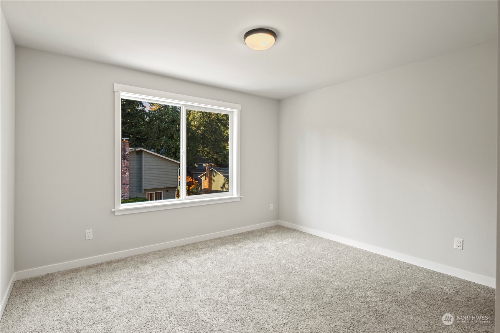8711 240th Street Southwest Edmonds, WA 98026 - Photo 30 of 37 an empty room with a window