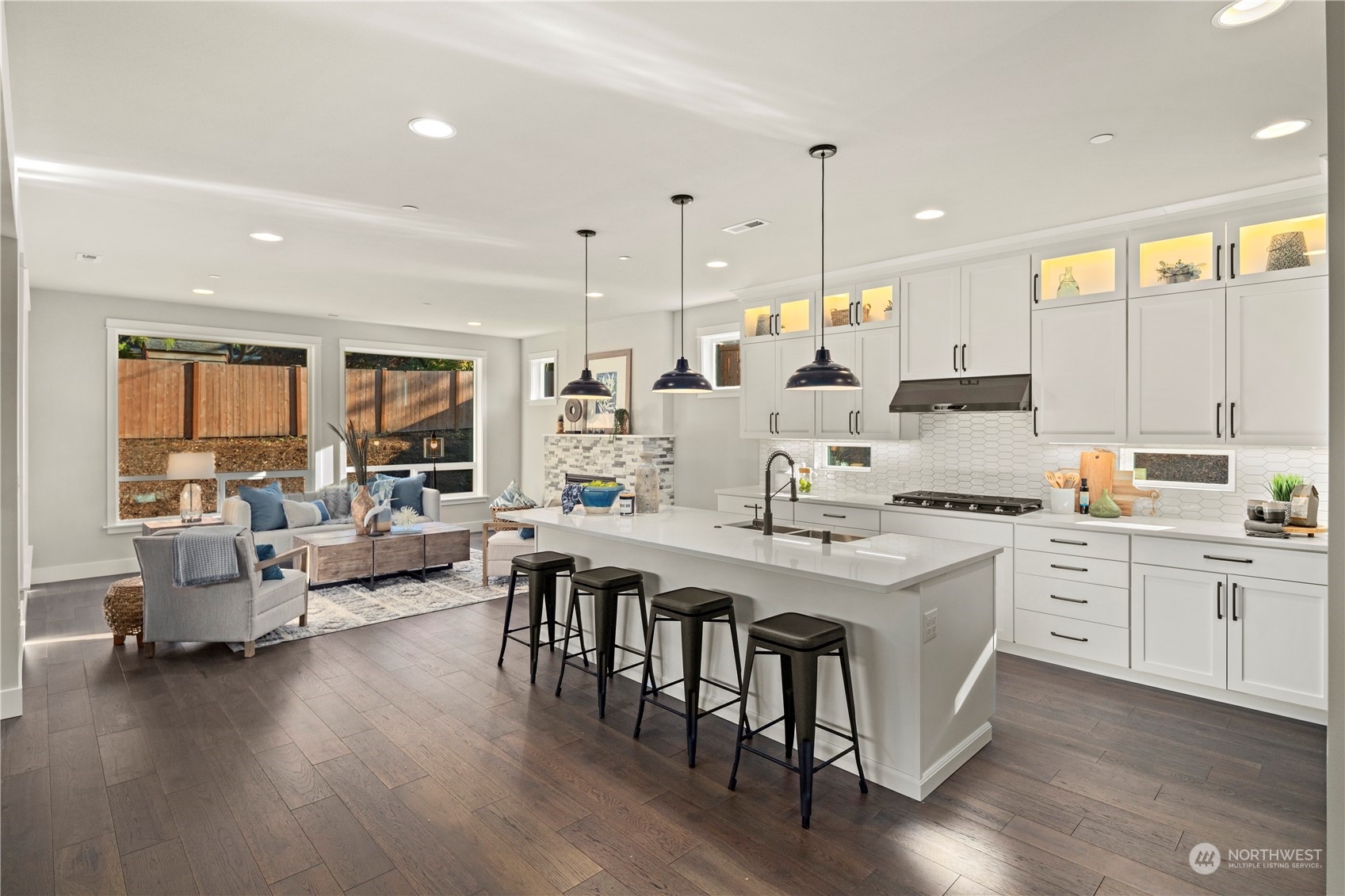 8711 240th Street Southwest Edmonds, WA 98026 - Photo 4 of 37 a large kitchen with a large window and white cabinets