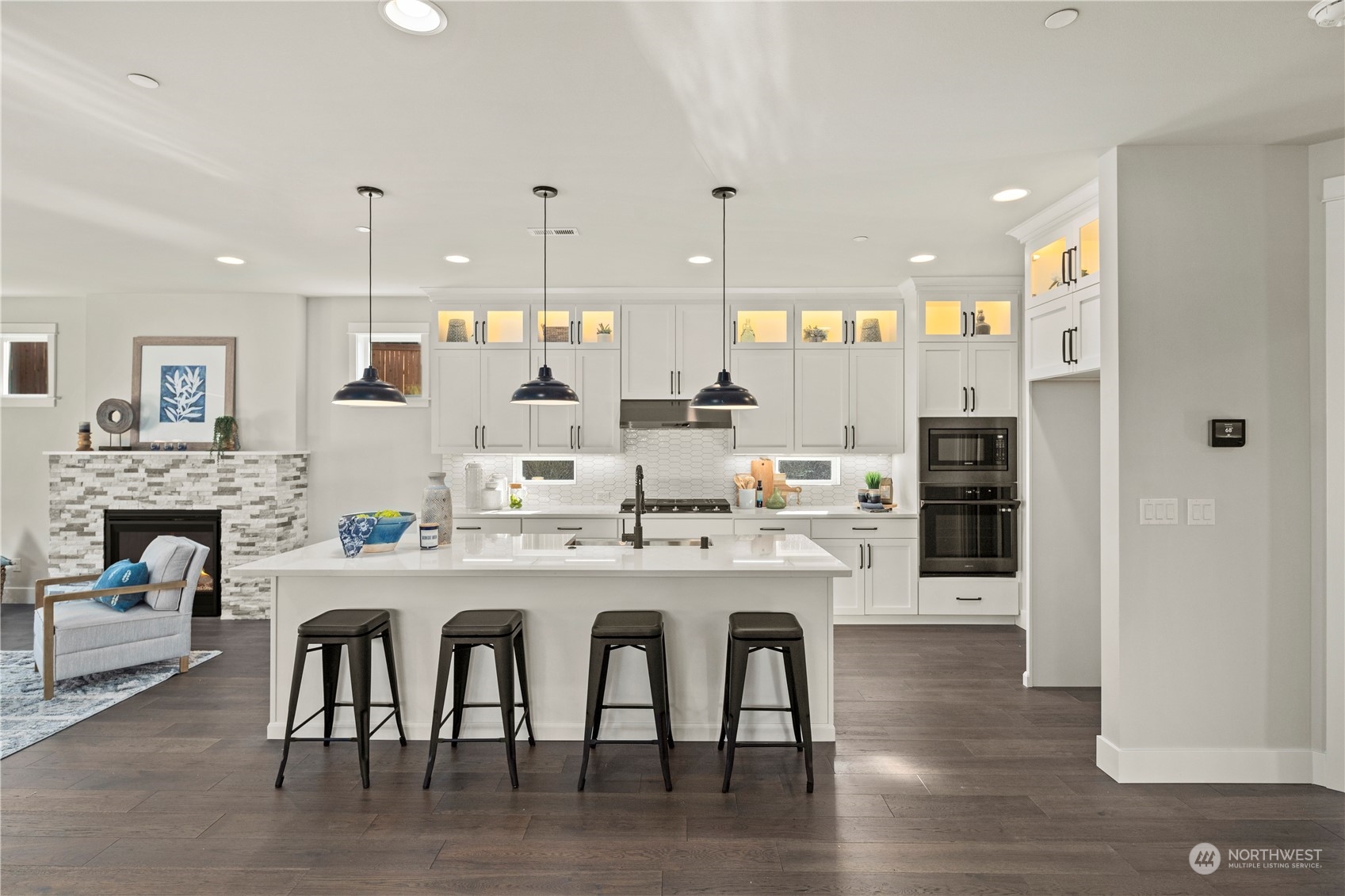 8711 240th Street Southwest Edmonds, WA 98026 - Photo 5 of 37 a large kitchen with a table and chairs