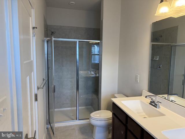 711 Quarry Point Road Malvern, PA 19355 - Photo 22 of 26 a bathroom with a sink toilet and shower