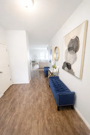 a living room with a couch and a table