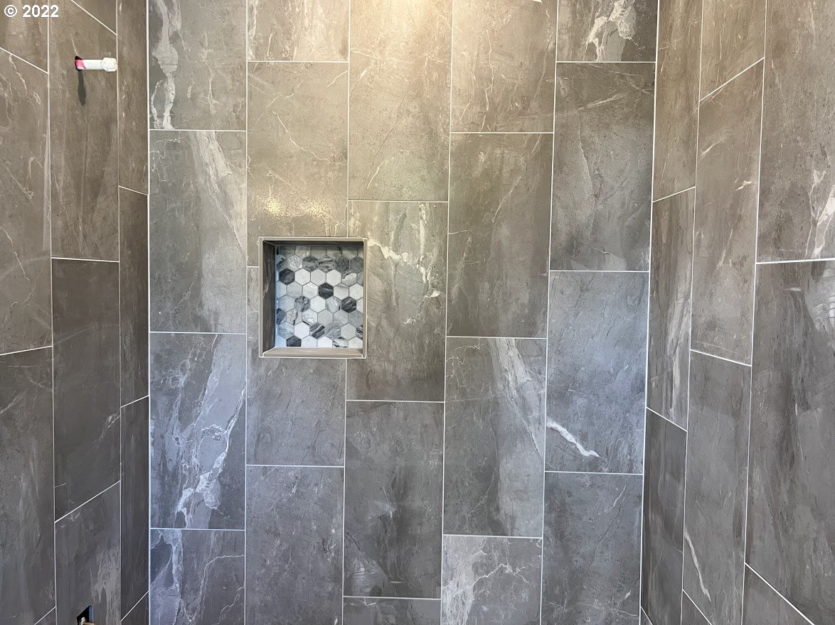 3901 South Hay Field Circle Ridgefield, WA 98642 - Photo 10 of 30 a bathroom with a shower