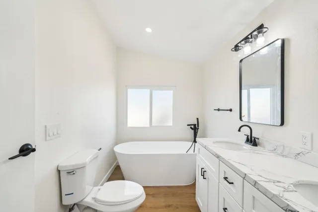 a bathroom with a shower and toilet