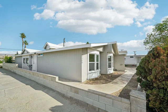 a view of a house with a patio