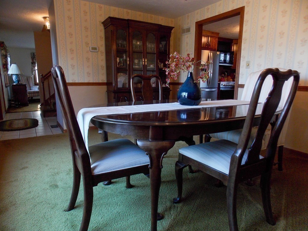 22 Lantern Lane Worcester, MA 01609 - Photo 13 of 32 a dining room with furniture and window