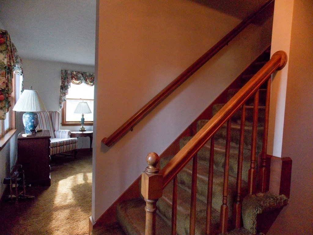22 Lantern Lane Worcester, MA 01609 - Photo 14 of 32 a view of entryway and hall with wooden floor