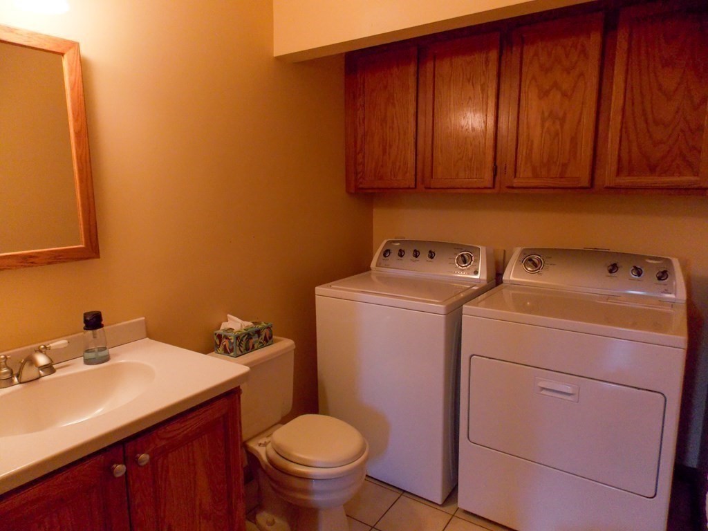 22 Lantern Lane Worcester, MA 01609 - Photo 18 of 32 a bathroom with a sink and a toilet