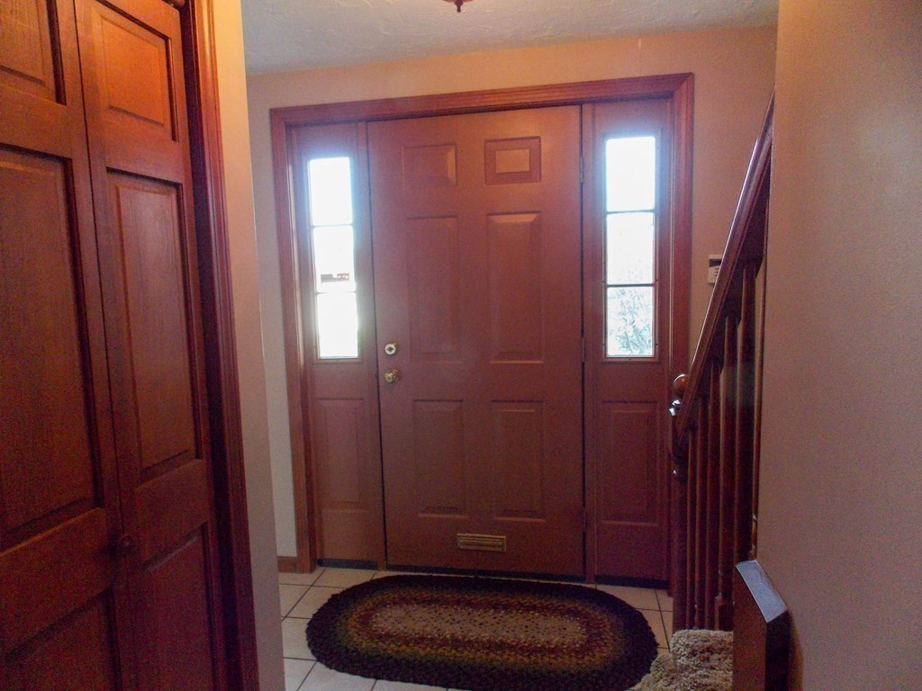 22 Lantern Lane Worcester, MA 01609 - Photo 19 of 32 a bathroom with a toilet a sink and mirror