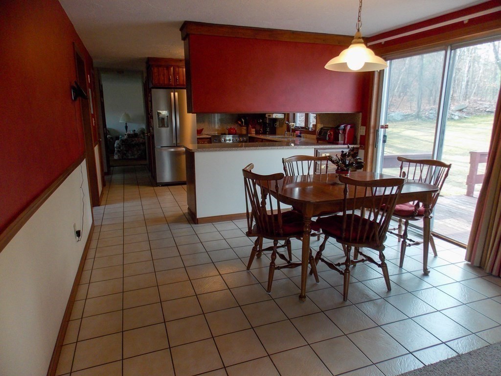 22 Lantern Lane Worcester, MA 01609 - Photo 9 of 32 a view of a dining room with furniture window and outside view