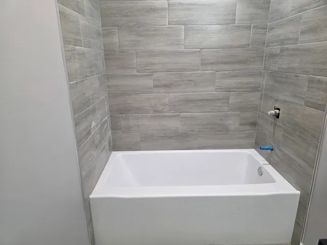 a bathroom with a bathtub