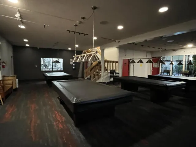 a room with gym equipment and a large window