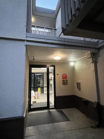 a view of an entryway with sitting area