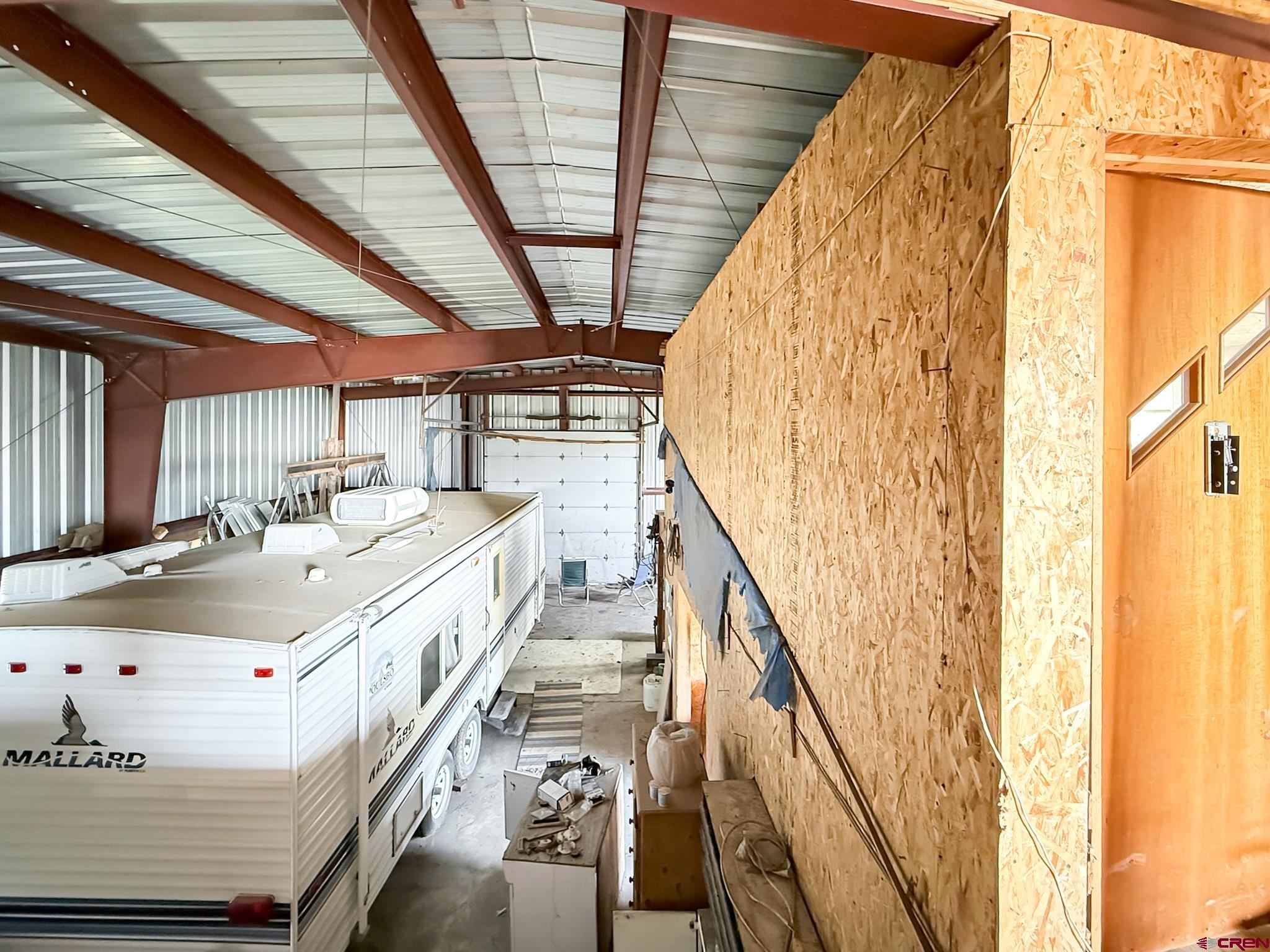 43867 Long Gulch Road Crawford, CO 81415 - Photo 19 of 45 a view of dining room with stairs