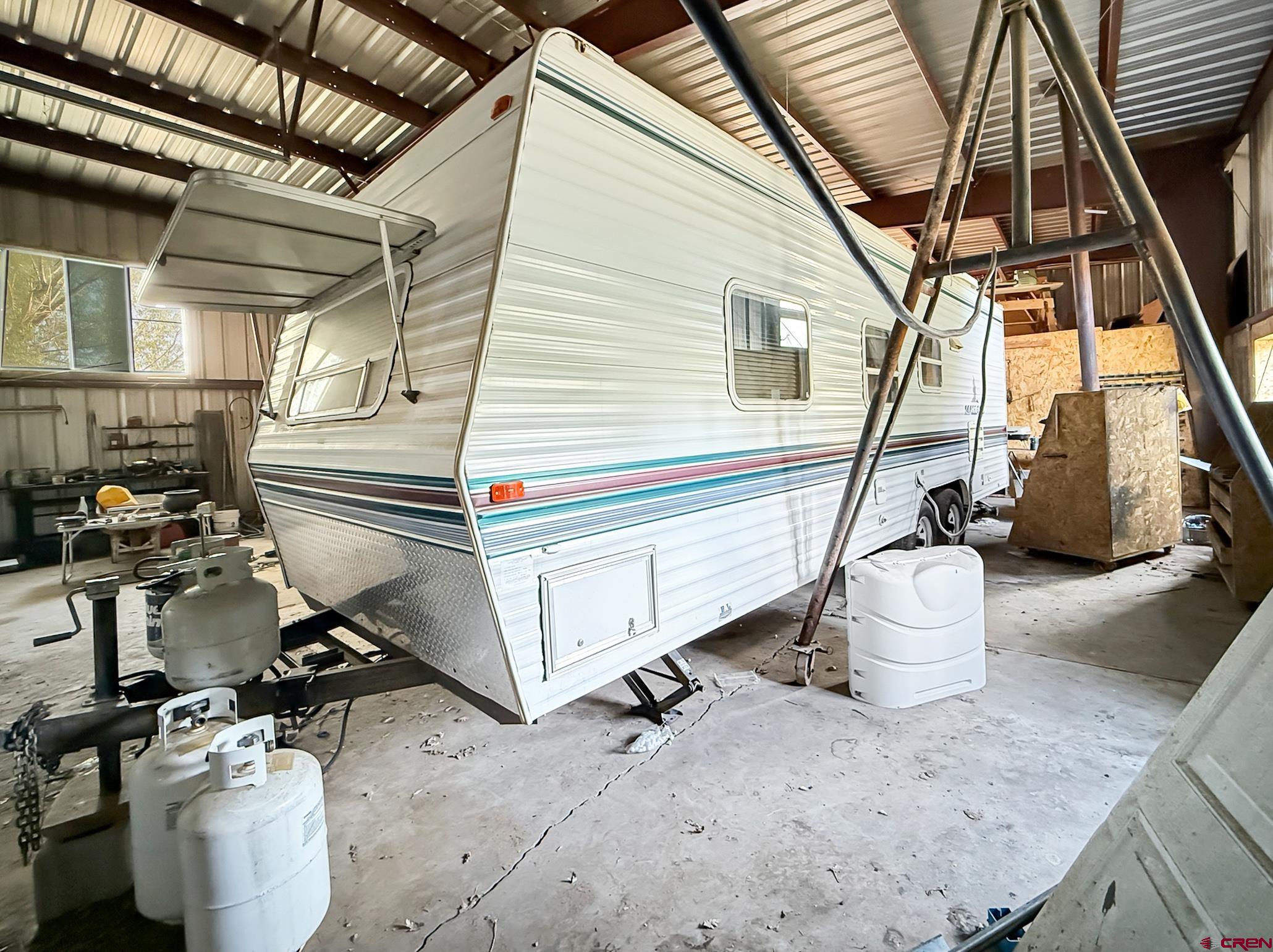 43867 Long Gulch Road Crawford, CO 81415 - Photo 26 of 45 a utility room with dryer and washer