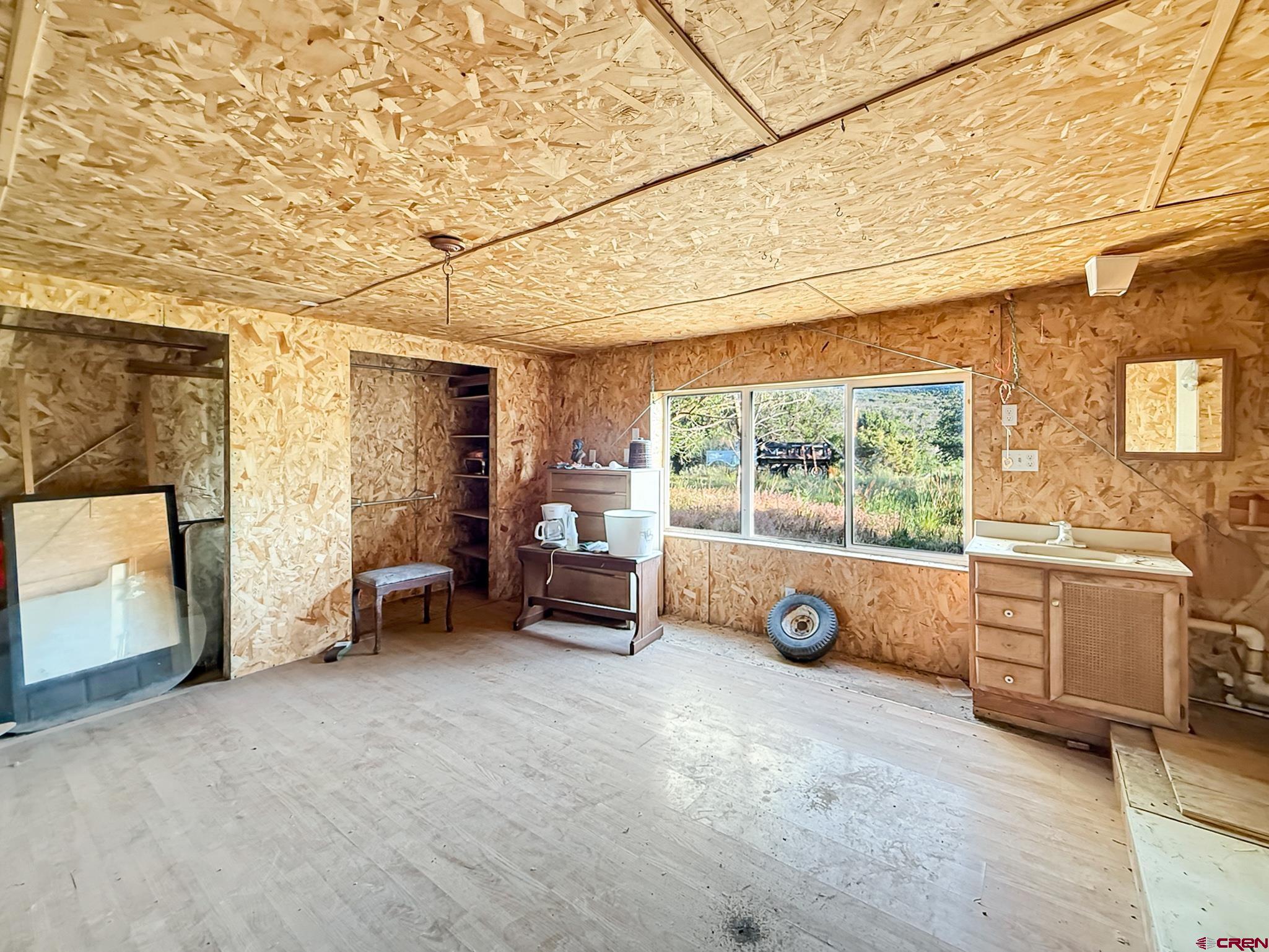 43867 Long Gulch Road Crawford, CO 81415 - Photo 29 of 45 a view of a livingroom with furniture and a window