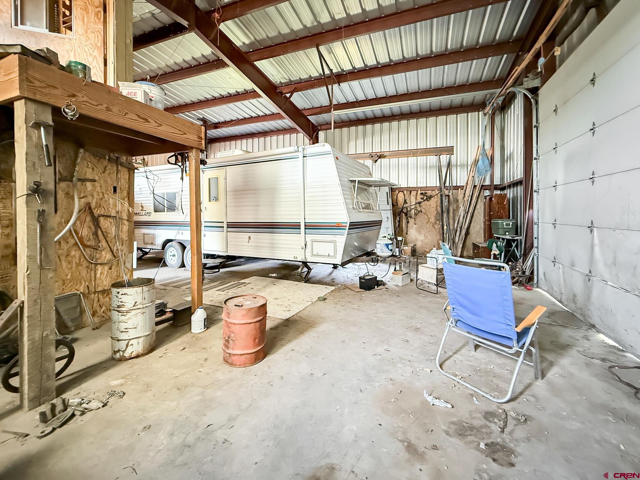 43867 Long Gulch Road Crawford, CO 81415 - Photo 30 of 45 a view of a chairs and table in the balcony