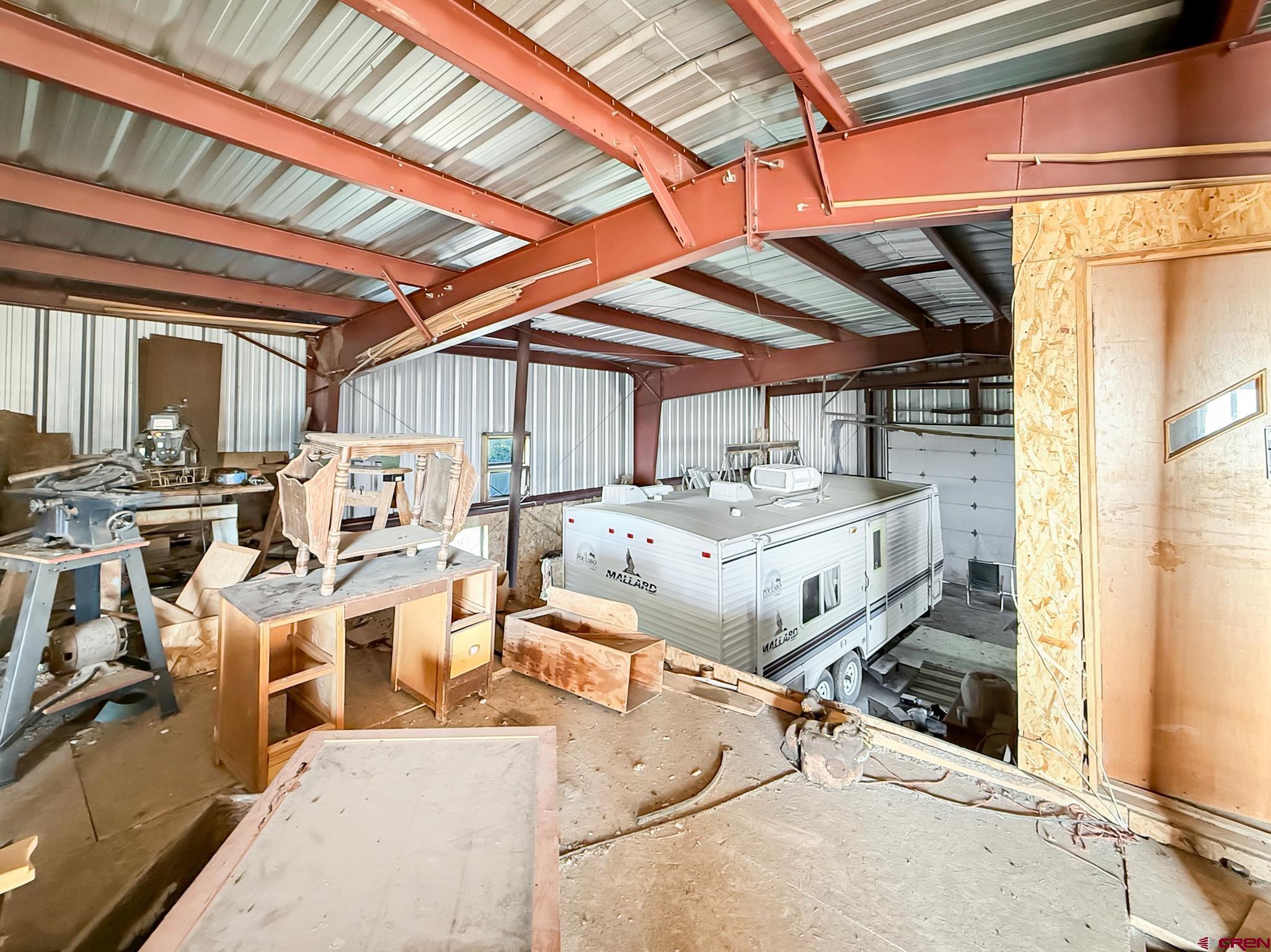 43867 Long Gulch Road Crawford, CO 81415 - Photo 38 of 45 a view of a patio with table and chairs