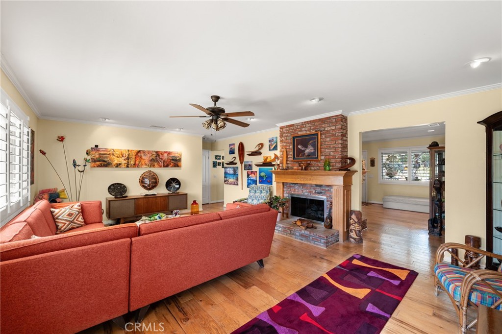 16620 Rocky Glen Road Perris, CA 92570 - Photo 13 of 72 a living room with furniture and a fireplace
