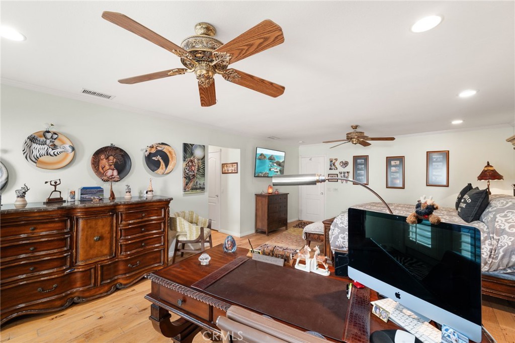 16620 Rocky Glen Road Perris, CA 92570 - Photo 31 of 72 a living room with furniture and wooden floor