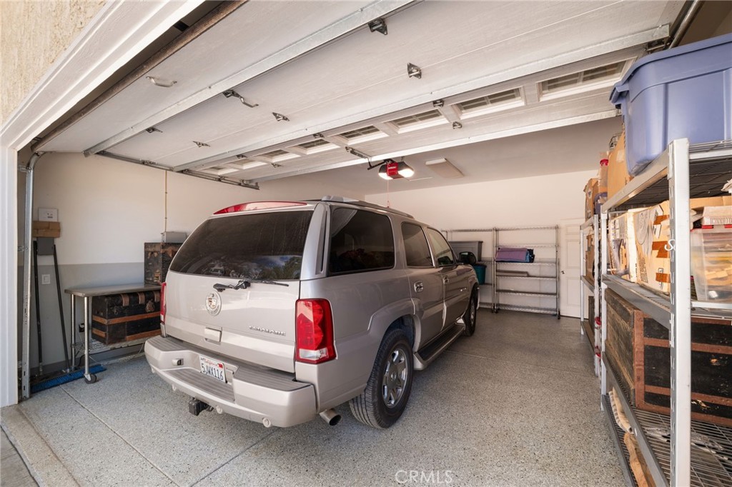 16620 Rocky Glen Road Perris, CA 92570 - Photo 36 of 72 a car is parked in a garage