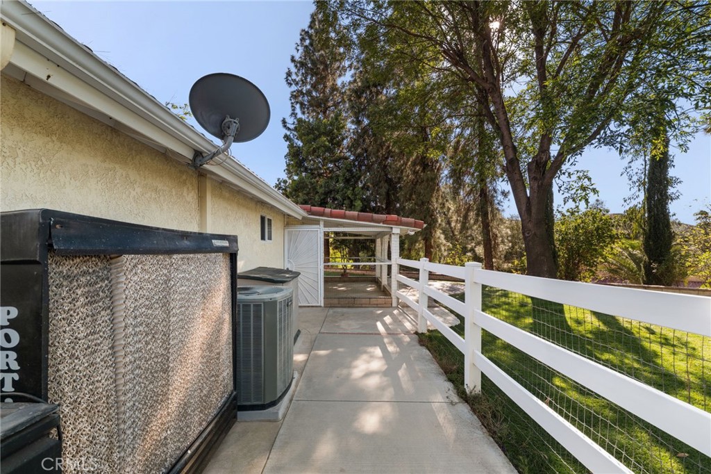 16620 Rocky Glen Road Perris, CA 92570 - Photo 42 of 72 a front view of a house with a garden