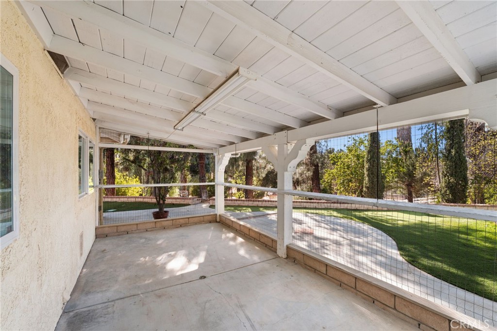 16620 Rocky Glen Road Perris, CA 92570 - Photo 43 of 72 a view of a porch with furniture and garden