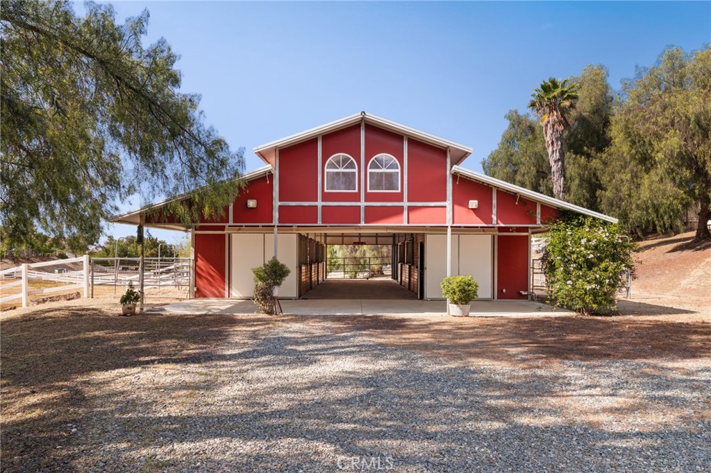16620 Rocky Glen Road Perris, CA 92570 - Photo 45 of 72 a front view of a house with a yard