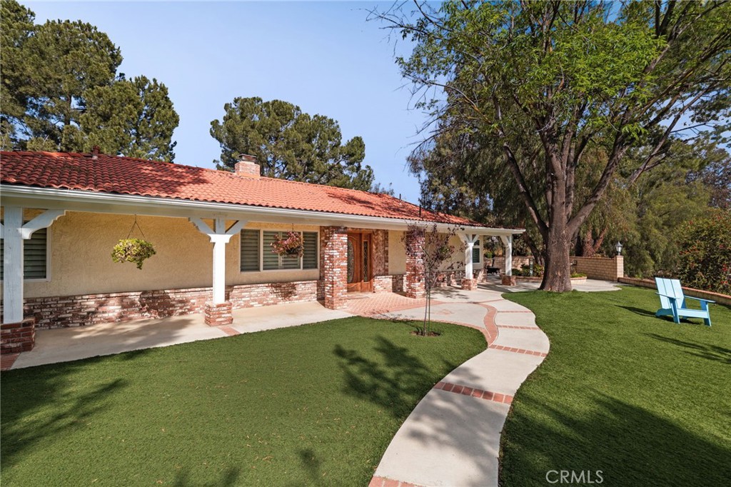 16620 Rocky Glen Road Perris, CA 92570 - Photo 68 of 72 a front view of house with outdoor seating yard and green space