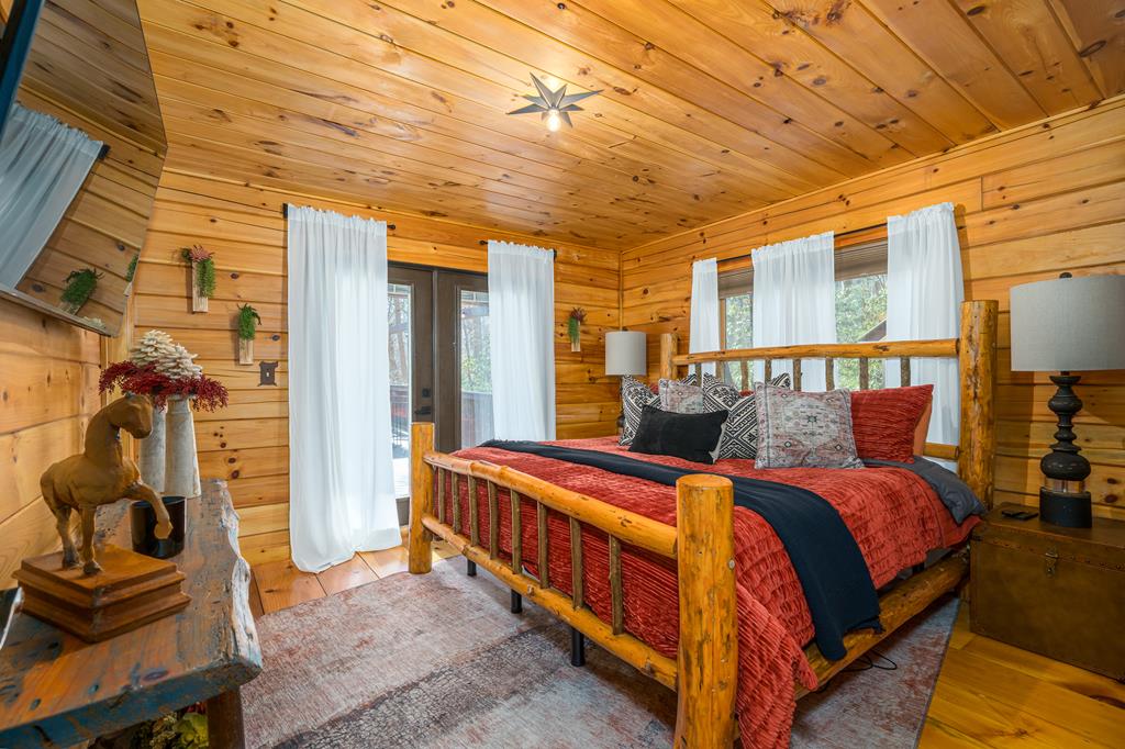 229 Ringtail Run Murphy, NC 28906 - Photo 24 of 68 a bed room with a bed and a window