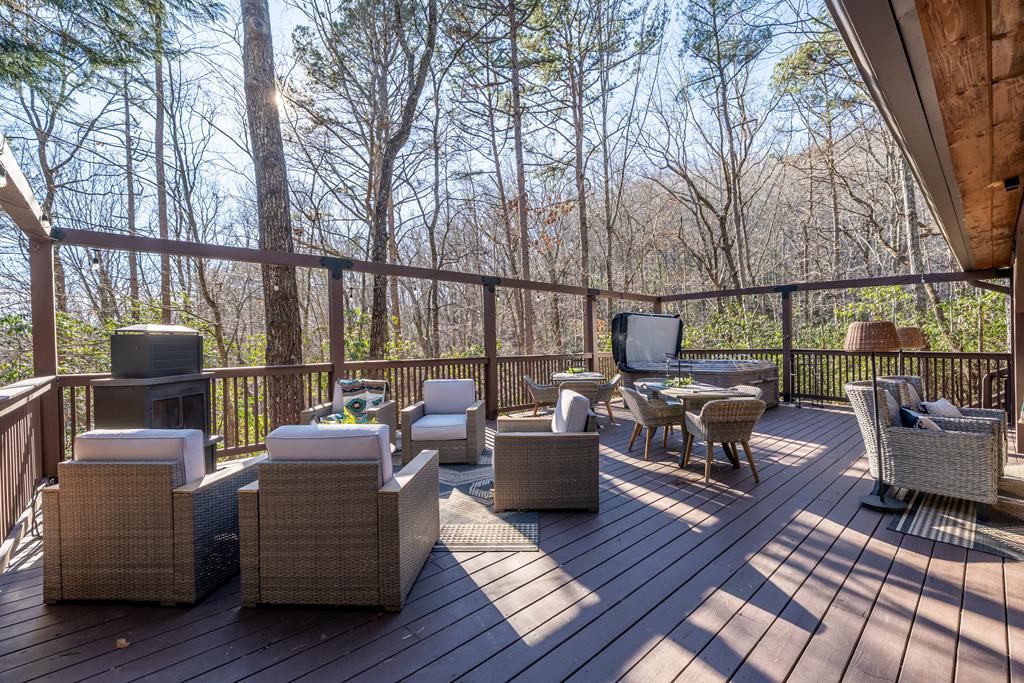 229 Ringtail Run Murphy, NC 28906 - Photo 40 of 68 a patio with patio couch and wooden floor