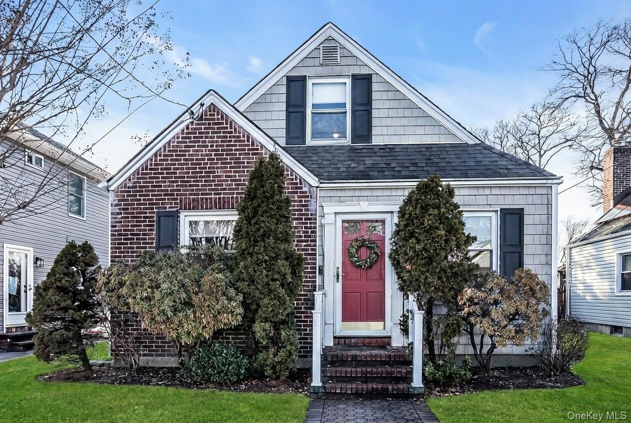 232 Ribbon Street Franklin Square, NY 11010 - Photo 1 of 19 a front view of a house with garden