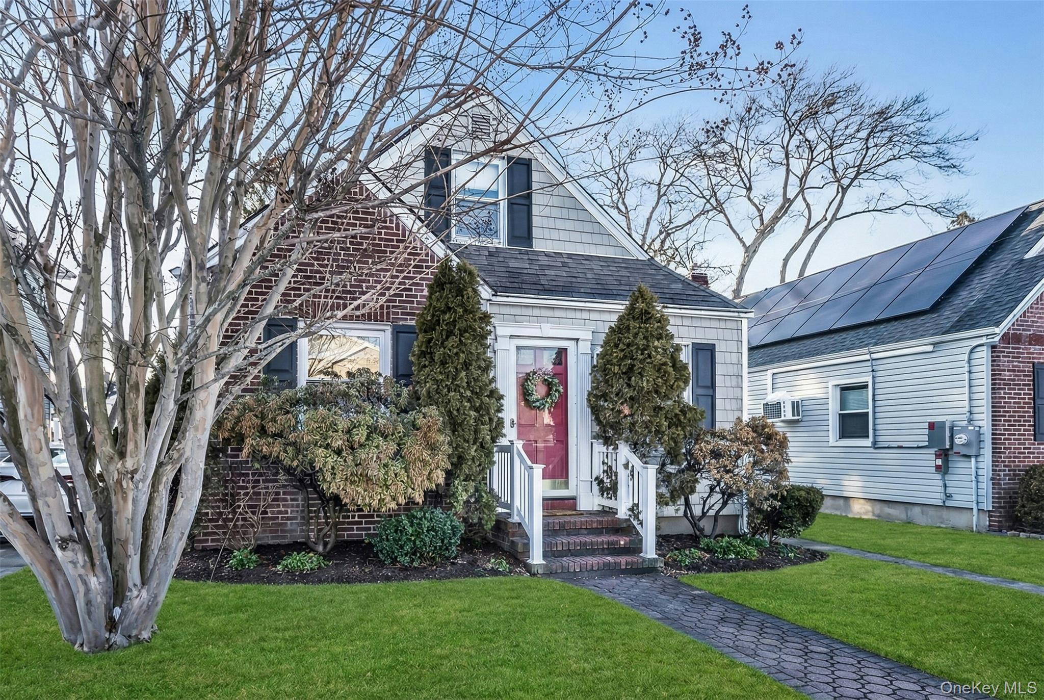 232 Ribbon Street Franklin Square, NY 11010 - Photo 2 of 19 a front view of a house with garden