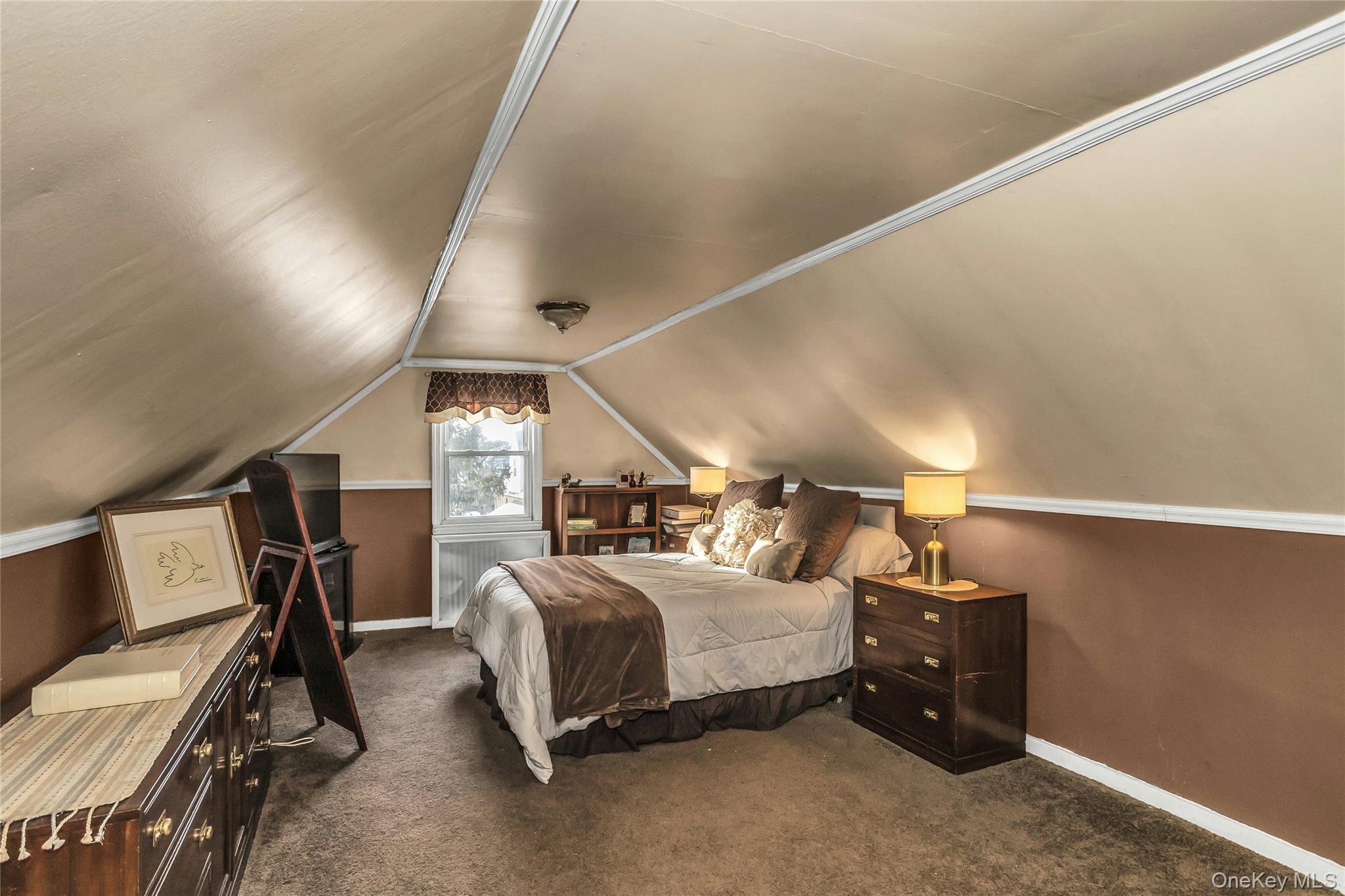 232 Ribbon Street Franklin Square, NY 11010 - Photo 10 of 19 a bedroom with bed and window