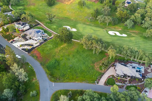 a view of a garden with a fountain