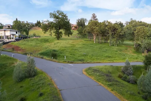 an aerial view of a house with outdoor space