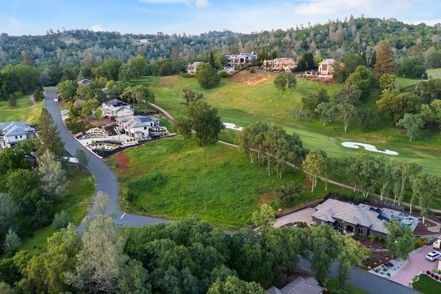 23725 Hogan Road Auburn, CA 95602 - Photo 8 of 8 an aerial view of a house with a garden