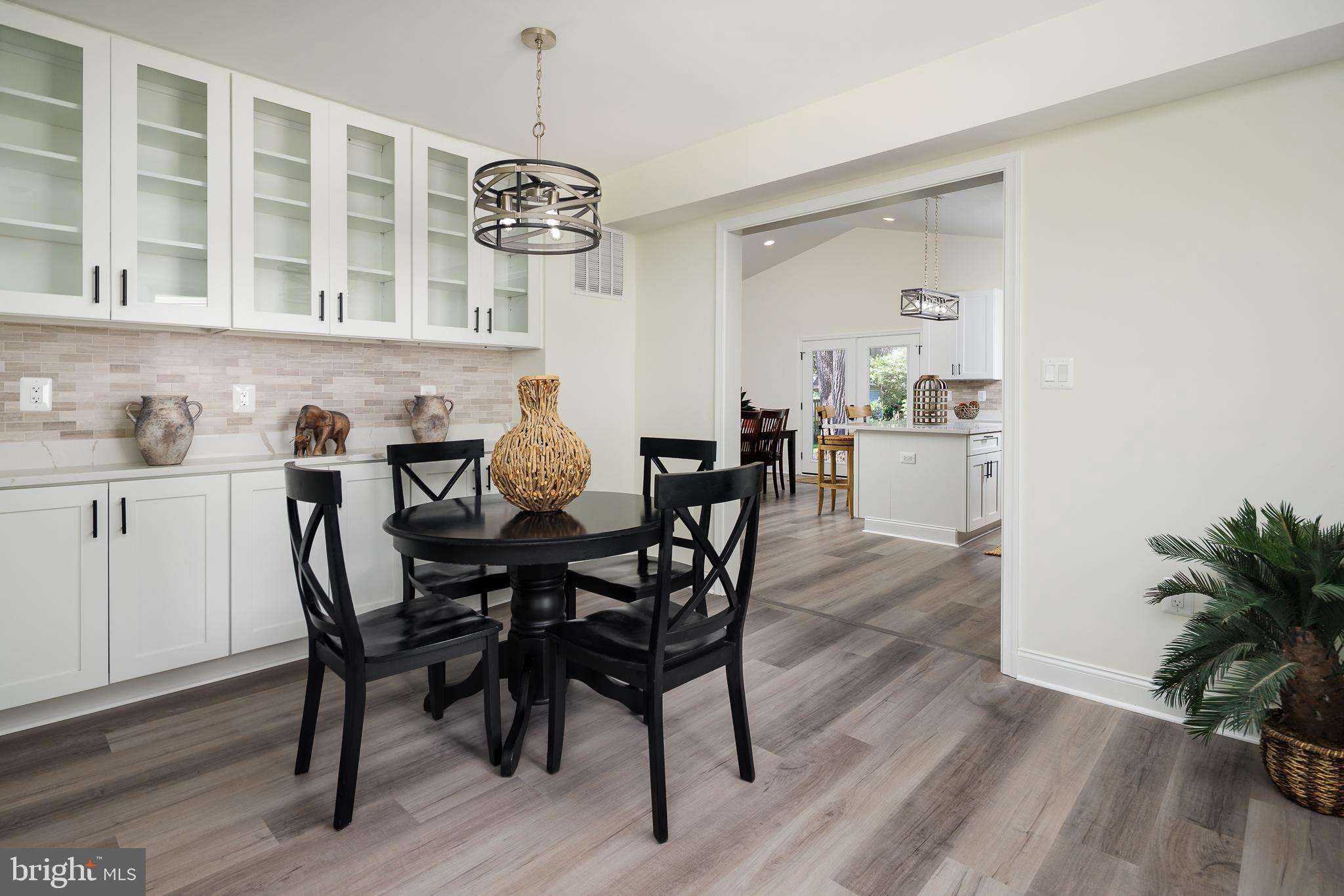 2836 Cameron Road Falls Church, VA 22042 - Photo 5 of 35 DINING RM OPENS TO KITCHEN, NOTE BUILD-IN CABINETS