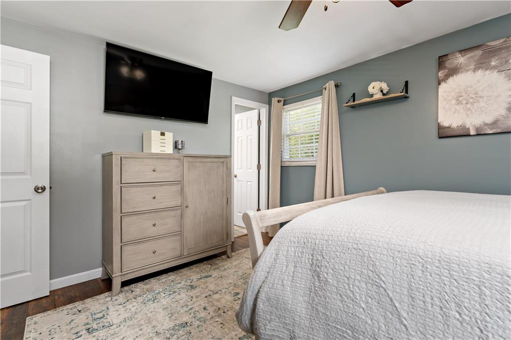 331 Trinity Drive Washington, PA 15301 - Photo 17 of 35 a bedroom with a bed and a flat screen tv