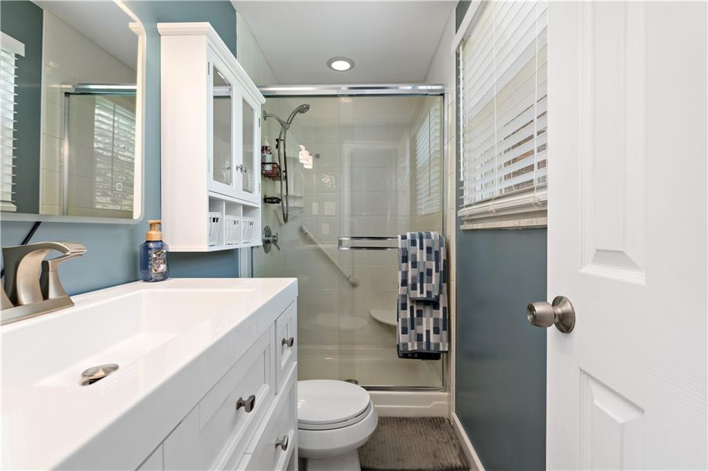331 Trinity Drive Washington, PA 15301 - Photo 18 of 35 a bathroom with a sink a toilet and shower