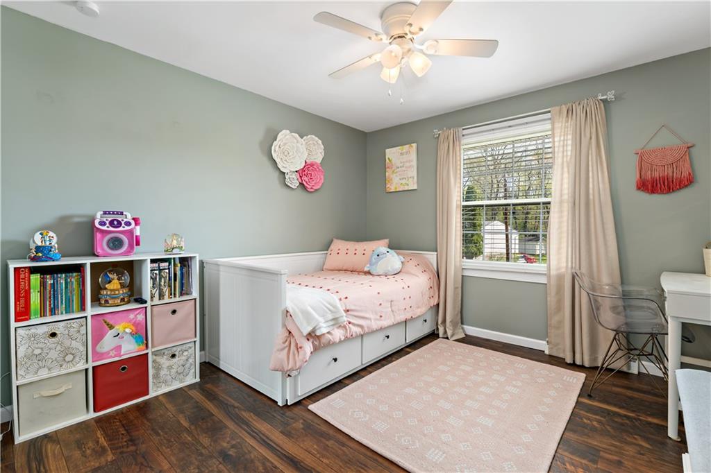 331 Trinity Drive Washington, PA 15301 - Photo 19 of 35 a bedroom with a bed and wooden floor