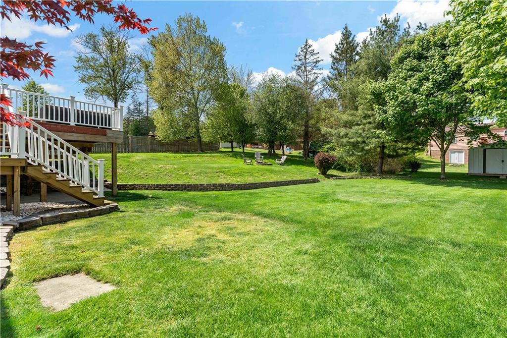 331 Trinity Drive Washington, PA 15301 - Photo 31 of 35 a view of a garden with a house and large trees