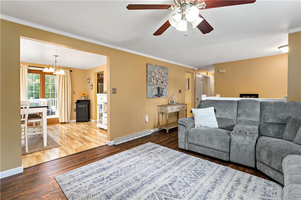 331 Trinity Drive Washington, PA 15301 - Photo 7 of 35 a living room with furniture and a chandelier