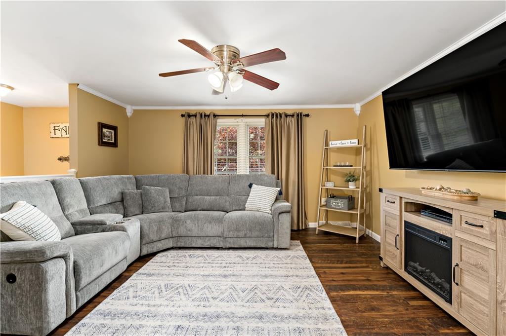 331 Trinity Drive Washington, PA 15301 - Photo 8 of 35 a living room with furniture flat screen tv and a fireplace