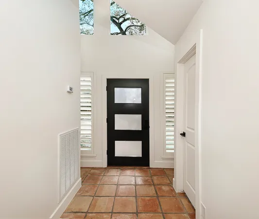 a view of an entryway with a window