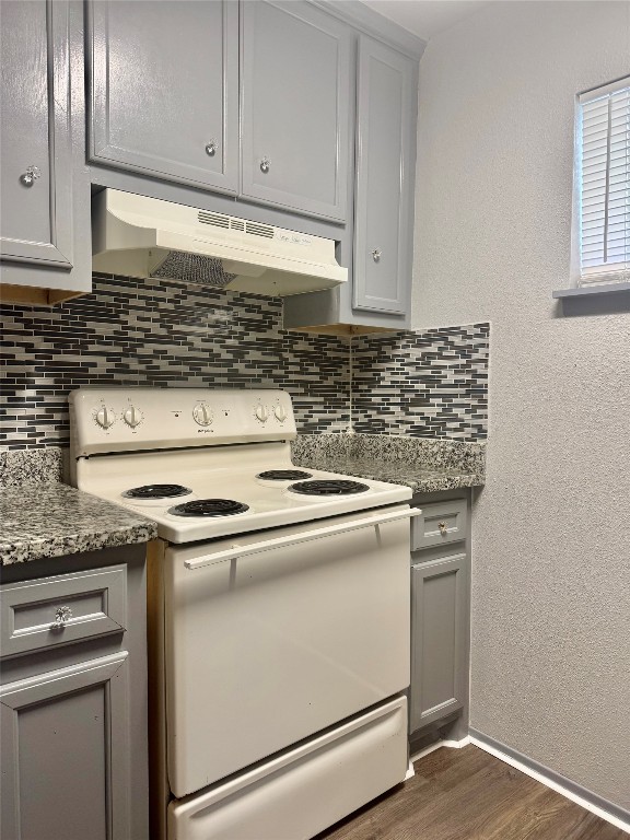 1005 Spooner Street, Unit 9 Pasadena, TX 77506 - Photo 3 of 7 a kitchen with granite countertop cabinets stainless steel appliances and sink