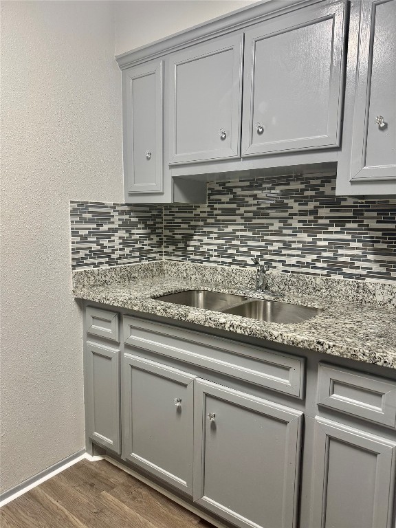 1005 Spooner Street, Unit 9 Pasadena, TX 77506 - Photo 4 of 7 a kitchen with granite countertop cabinets and sink