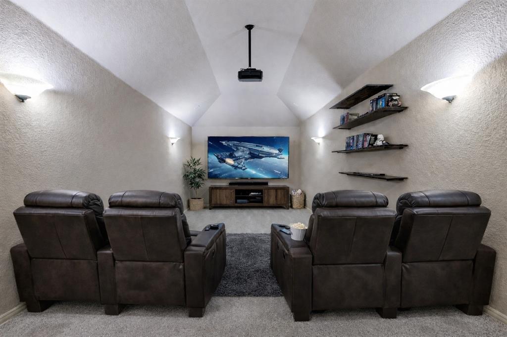 1137 Cardinal Ridge Road Burleson, TX 76028 - Photo 14 of 28 a living room with furniture and a flat screen tv